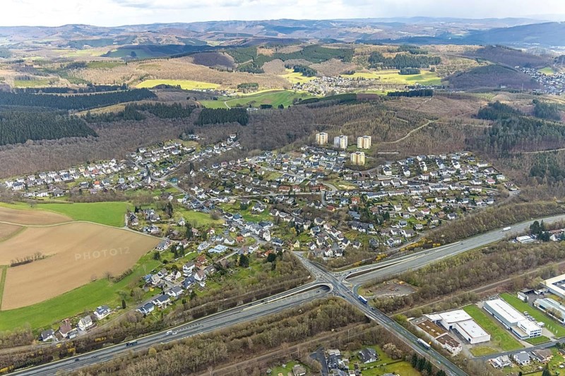 Aerial view, Hüttentalstraße and district Buschhütten, Kreuztal, Sauerland, North Rhine-Westphalia, Germany, federal road B54, DE, Europe, property tax, high-rise buildings, hilly landscape, real estate, district Siegen-Wittgenstein, aerial view, aerial photography, aerial photography, overview, bird's-eye view, wooded area, residential area, living and living, residential area, residential buildings, quality of life, birds-eyes view, overview