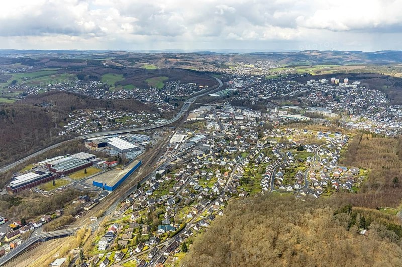 Aerial view, Hüttentalstraße, B54, commercial area Siegener Straße, Buschhütten, Kreuztal, Sauerland, North Rhine-Westphalia, Germany, federal road B54, DE, Europe, commercial enterprises, commercial area, commercial location, commercial use, hilly landscape, industrial area, industrial location, district Siegen-Wittgenstein, aerial view, aerial photography, aerial photography, overview, bird's-eye view, overview