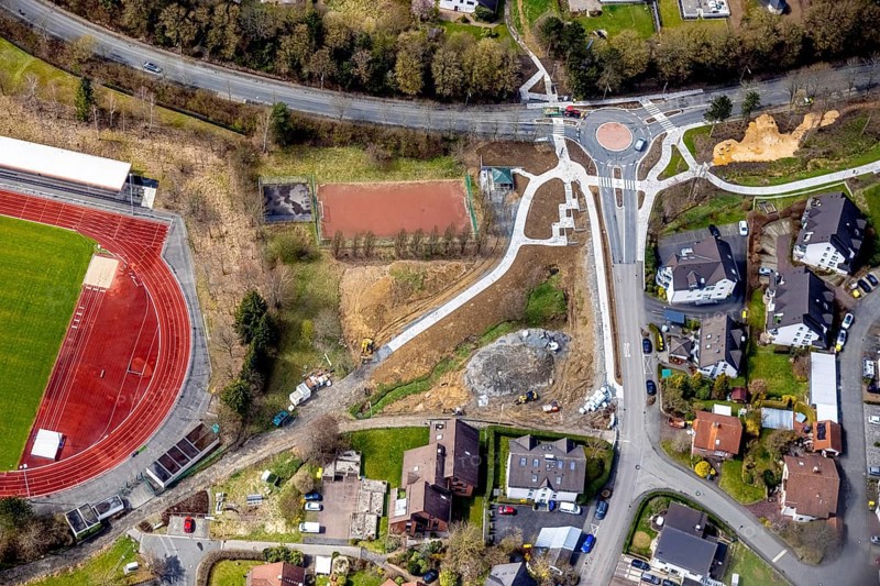 Aerial view, roundabout and construction site Hessengarten corner Zum Erbstollen, new construction footpath and cycle path, Kreuztal, Sauerland, North Rhine-Westphalia, Germany, construction work, construction area, building site, building plots, construction project, construction site, DE, Europe, Siegen-Wittgenstein district, aerial view, aerial photography, aerial photography, overview, bird's-eye view, bird's-eye view, overview