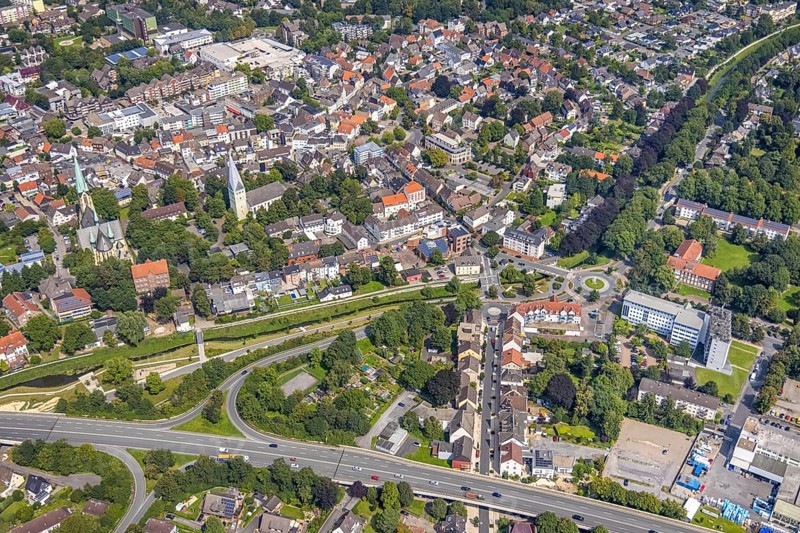 Aerial view, city centre with Sesekepark between Maibrücke and Hochstraße with river Seseke and catholic parish church Zur Heiligen Familie and evang. Pauluskirche in Kamen, Ruhr area, North Rhine-Westphalia, Germany, place of worship, federal road B233, City, DE, Europe, religious community, place of worship, holy place, city centre, Kamen, church, parish, denomination, aerial view, aerial photography, aerial photography, market place, town view, park, religion, religious site, townscape, urban area, city centre, overview, bird's-eye view, overview