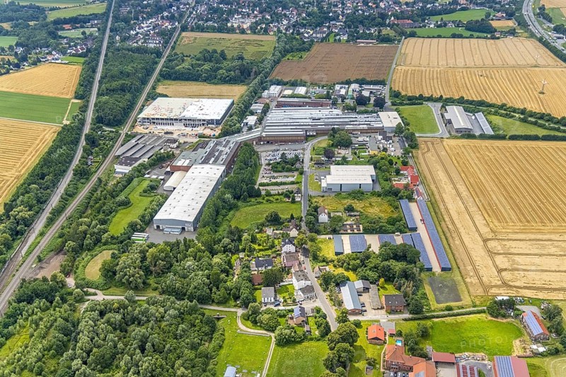 Aerial view, construction site and new construction logistics centre Schäferkampstraße and industrial estate in Hohenleuchte, Holzwickede, Ruhr area, North Rhine-Westphalia, Germany, construction work, construction, construction area, building site, building plots, construction measure, construction project, construction site, DE, Europe, commercial enterprises, commercial area, industrial estate, commercial location, commercial use, industrial area, industrial site, logistics, logistics service, logistics service provider, logistics provider, logistics centre, aerial view, aerial photography, aerial photography, new construction, photovoltaic, photovoltaic system, solar, solar system, solar roof, solar energy, overview, bird's-eye view, birds-eyes view, overview