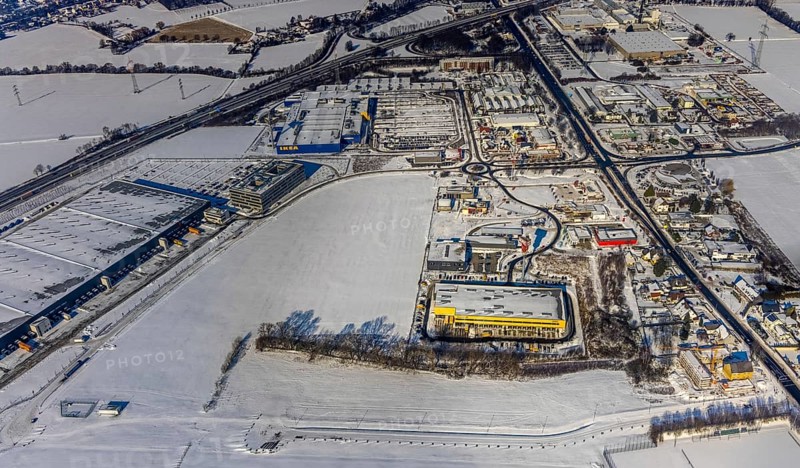Aerial view, Kamen-Karree, commercial area Unna / Kamen, IKEA furniture store Kamen, Deutsche Post DHL, MechZB Kamen, ERL euro Retail Logistics, Mercure Hotel, 3M Deutschland GmbH - Werk Kamen, motorway junction Kamen-Zentrum Kamen, Ruhr area, North Rhine-Westphalia, Germany, motorway A1, motorway police, federal road B233, DE, Europe, gastronomy, commercial enterprises, commercial area, commercial area, commercial park, commercial location, commercial use, hotel, hotel facilities, hotel business, industrial area, industrial location, Kamen, aerial view, aerial photography, aerial photography, snow, overview, Unnaer Straße, bird's eye view, winter, delivery base, birds-eyes view, overview