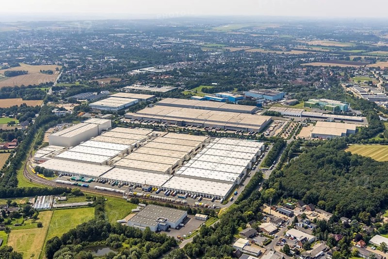Aerial view, commercial area Unna-Nord with Fiege Unna GmbH and DHL Logistics, Alte Heide in Unna, Ruhr area, North Rhine-Westphalia, Germany, DE, Europe, commercial enterprises, commercial area, commercial park, commercial location, commercial use, industrial area, industrial building, industrial location, aerial photograph, aerial photography, aerial photography, overview, Unna, bird's-eye view, birds-eyes view, overview