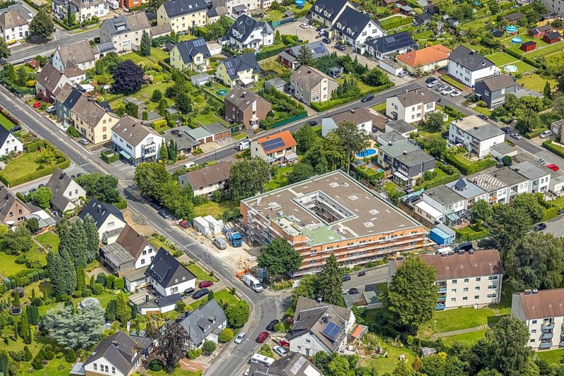 Aerial view, construction site and new construction nursing home Katharina-von-Bora-Haus of the Perthes-Stiftung, Winkelstraße corner Wichernstraße, Holzwickede, Ruhr area, North Rhine-Westphalia, Germany, retirement home, old people's home, construction work, construction, construction area, building site, building plots, construction project, construction project, construction site, care and nursing, DE, Europe, aerial view, aerial photography, aerial photography, new building, care facility, retirement home, retirement residence, retirement home, senior centre, overview, bird's-eye view, birds-eyes view, former community centre south, overview