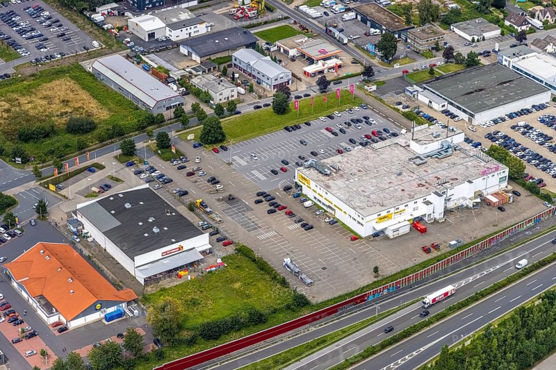 Aerial view, local supply centre Wilhelmstraße, Adler, Tedox, Das Futterhaus, Natorp, Holzwickede, Ruhr area, North Rhine-Westphalia, Germany, DE, shopping centre, shopping markets, shopping place, Europe, aerial view, aerial photography, aerial photography, local supply centre, car parks, overview, bird's-eye view, overview, Adler textile company