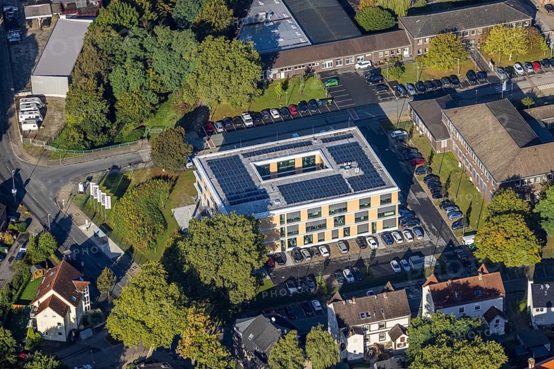 Aerial view, new building with solar roof of the company headquarters of the Heitkamp Group on the Pluto site on Wilhelmstraße in the Wanne district of Herne, Ruhr area, North Rhine-Westphalia, Germany, DE, Europe, commercial enterprises, commercial area, commercial area, commercial location, commercial use, Herne, aerial view, aerial photography, aerial photography, new building, photovoltaics, photovoltaic system, solar, solar system, solar roof, solar energy, overview, bird's eye view, birds-eyes view, overview