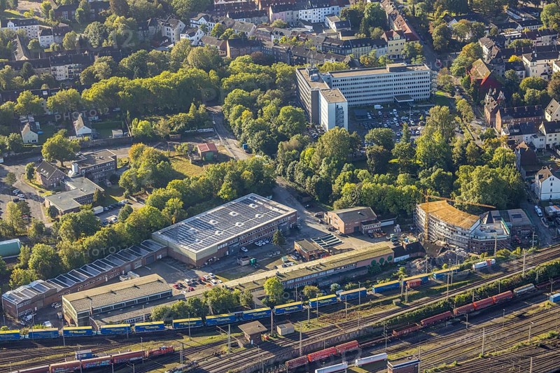 Aerial view, former Heitkamp-Villa construction site and new building for flats at Heitkampsfeld and TROPOS MOTORS EUROPE solar roof building in the district Wanne-Süd in Herne, Ruhr area, North Rhine-Westphalia, Germany, construction work, construction area, construction site, building plots, building crane, building project, building site, DE, Europe, property tax, Heitkampsfeld, Herne, real estate, aerial view, aerial photography, aerial photography, new building, overview, bird's eye view, living and life, residential buildings, birds-eyes view, overview