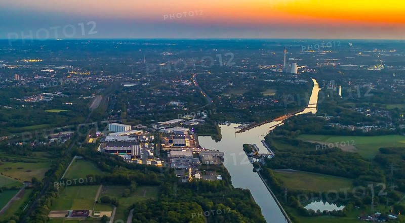 Aerial view, Herner Meer, Rhine-Herne Canal, Friedrich der Große industrial estate, Herne-East lock, STEAG Herne thermal power station, Pöppinghausen, Castrop-Rauxel, Ruhr area, North Rhine-Westphalia, Germany, sunset, DE, twilight photography, Europe, commercial enterprises, commercial area, industrial estate, industrial park, commercial location, commercial use, IGZ Herne, industrial area, industrial building, industrial location, power plant, light pollution, aerial photography, aerial photography, aerial photography, night, night photography, night flight, airlock, overview, bird's eye view, illuminated streets, birds-eyes view, nightflight, overview