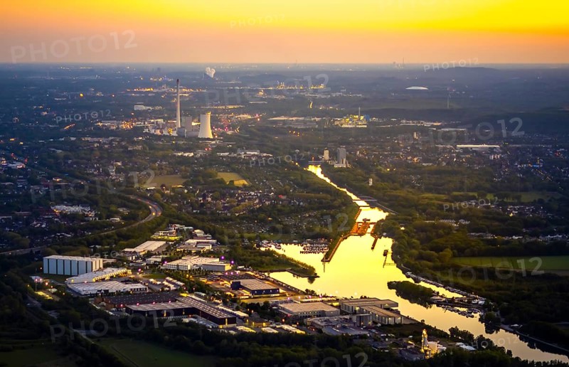 Aerial view, Herner Meer, Rhine-Herne Canal, Friedrich der Große industrial estate, Herne-East lock, STEAG Herne thermal power station, Pöppinghausen, Castrop-Rauxel, Ruhr area, North Rhine-Westphalia, Germany, sunset, DE, twilight photography, Europe, commercial enterprises, commercial area, industrial estate, industrial park, commercial location, commercial use, IGZ Herne, industrial area, industrial building, industrial location, power plant, light pollution, aerial photography, aerial photography, aerial photography, night, night photography, night flight, airlock, overview, bird's eye view, illuminated streets, birds-eyes view, nightflight, overview
