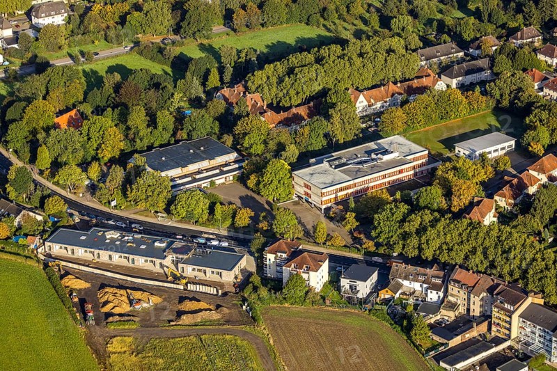 Aerial view, Sodingen secondary school and construction site with new building of a day care centre Am vineyard at Castroper Straße in the district Börnig in Herne, Ruhr area, North Rhine-Westphalia, Germany, construction work, construction area, construction site, building plots, construction project, construction site, DE, Europe, Herne, kindergarten, day care centre, day care facility, day care centre, aerial view, aerial photography, aerial photography, new building, overview, bird's eye view, overview