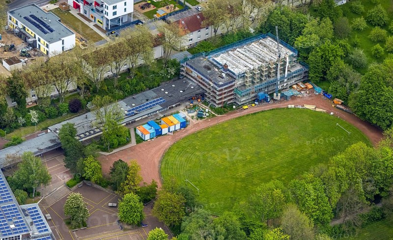 Aerial view, Otto-cock-Gymnasium with construction site indoor swimming pool, Sodingen, Herne, Ruhr area, North Rhine-Westphalia, Germany, construction work, construction, construction area, building site, building plots, construction measure, construction project, construction site, education, educational institution, DE, Europe, grammar school, indoor swimming pool, educational institute, aerial view, aerial photography, aerial photography, Rhine-Ruhr metropolitan region, photovoltaic, photovoltaic system, school, solar, solar system, solar energy, solar energy, overview, bird's-eye view, birds-eyes view, overview
