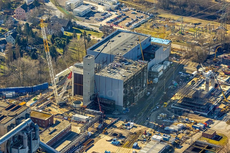 Aerial photo, STEAG combined heat and power plant Herne on the Rhine-Herne Canal, construction site new gas and steam power plant, Baukau-West, Herne, Ruhr area, North Rhine-Westphalia, Germany, construction work, construction, construction area, construction site, construction project, construction site, DE, steam cloud, power plant, Europe, district heating, combined cycle power plant, Hertener Straße, power plant, aerial view, aerial photography, aerial photography, Rhine-Ruhr metropolitan region, new construction, smoke cloud, coal-fired power plant, overview, bird's-eye view, overview