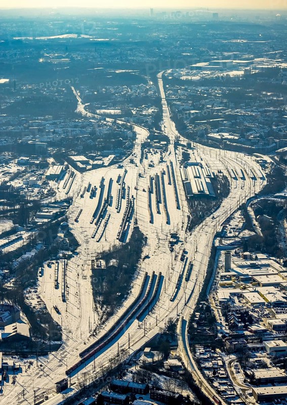 Aerial view, Wanne-Eickel main station, signal box, railway tracks in the snow, Baukau-West, Herne, Ruhr area, North Rhine-Westphalia, Germany, railway tracks, station, DE, Deutsche Bahn AG, Europe, railway tracks, goods trains, main station, central station, aerial view, aerial photography, aerial photography, snow, overview, bird's eye view, winter, birds-eyes view, overview