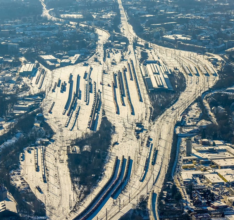 Aerial view, Wanne-Eickel main station, signal box, railway tracks in the snow, Baukau-West, Herne, Ruhr area, North Rhine-Westphalia, Germany, railway tracks, station, DE, Deutsche Bahn AG, Europe, railway tracks, goods trains, main station, central station, aerial view, aerial photography, aerial photography, snow, overview, bird's eye view, winter, birds-eyes view, overview
