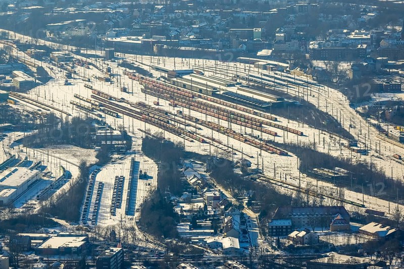 Aerial view, Wanne-Eickel main station, signal box, railway tracks in the snow, Baukau-West, Herne, Ruhr area, North Rhine-Westphalia, Germany, railway tracks, station, DE, Deutsche Bahn AG, Europe, railway tracks, goods trains, main station, central station, aerial view, aerial photography, aerial photography, snow, overview, bird's eye view, winter, birds-eyes view, overview