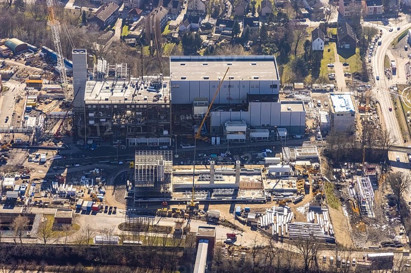 Aerial photo, STEAG combined heat and power plant Herne on the Rhine-Herne Canal, construction site new gas and steam power plant, Baukau-West, Herne, Ruhr area, North Rhine-Westphalia, Germany, construction work, construction, construction area, construction site, construction project, construction site, DE, steam cloud, power plant, Europe, district heating, combined cycle power plant, Hertener Straße, power plant, aerial view, aerial photography, aerial photography, Rhine-Ruhr metropolitan region, new construction, smoke cloud, coal-fired power plant, overview, bird's-eye view, overview