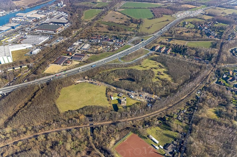 Aerial view, nature reserve Voßnacken, motorway A42, motorway junction Herne-Börnig, Börnig, Herne, Ruhr area, North Rhine-Westphalia, Germany, construction work, construction area, building site, building plots, construction project, construction site, DE, Europe, aerial view, aerial photography, aerial photography, nature reserve, electricity pylons, overview, bird's-eye view, overview