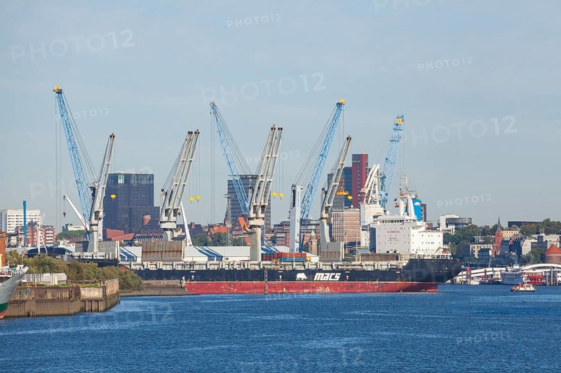 Hansa harbour with ship and skyscrapers of St. Pauli, Veddel, Hamburg, Germany