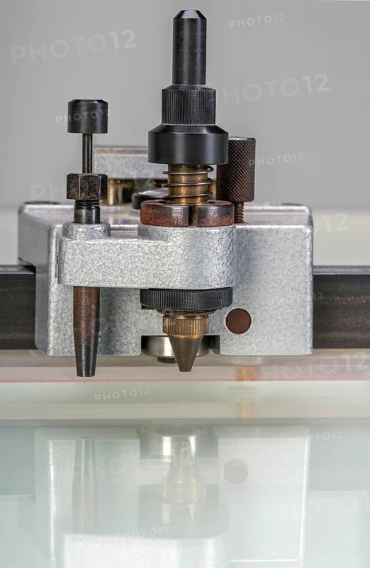 Detail shot of a layout table showing the drawing unit with fixation