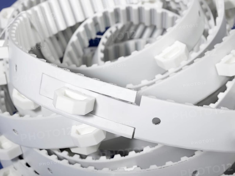 A white entangled drive belt