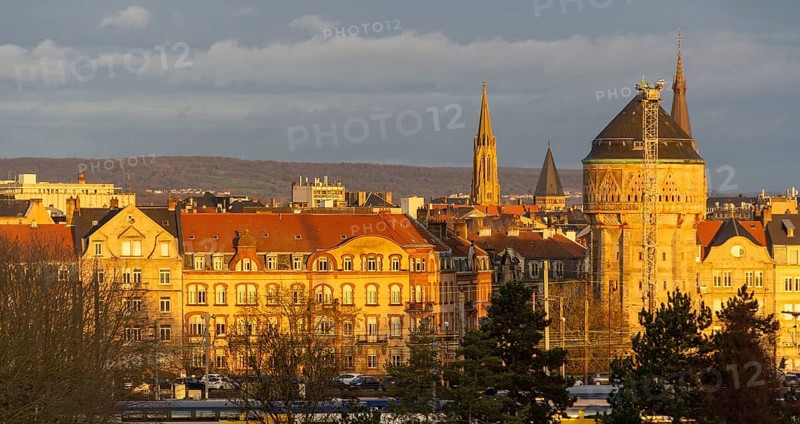 Sunny illuminated high angle view of Metz, a city in the Lorraine region at northeast France at evening time
