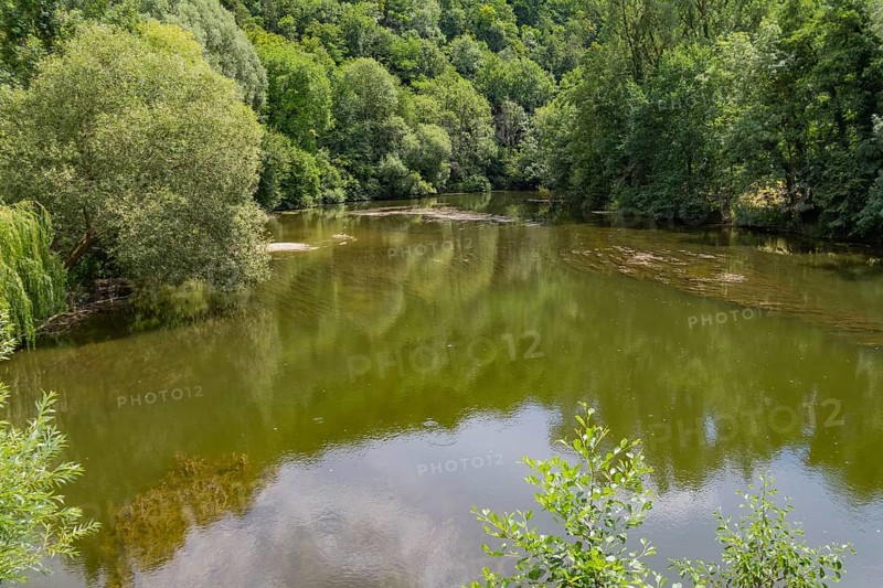 Riparian scenery around river Jagst in southern Germany at summer time