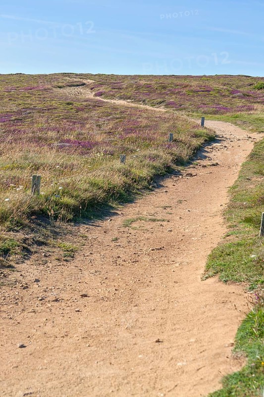 Coastal scenery including a footpath around Pointe du Van, a promontory in Brittany, France