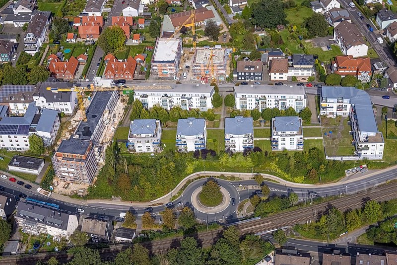 Aerial view, construction site and new senior citizens' home next to the Hans-Grünewald-Haus and Heideschulstraße residential complex in the Rosendahl district of Gevelsberg, Ruhr area, North Rhine-Westphalia, Germany, construction work, construction area, building site, building plots, construction project, construction site, care and nursing, DE, Europe, Evangelische Stiftung Volmarstein, Gevelsberg, property tax, real estate, roundabout, roundabout, aerial view, aerial photography, aerial photography, new building, care facility, retirement home, overview, bird's-eye view, residential complex, living and living, residential buildings, housing estate, birds-eyes view, overview