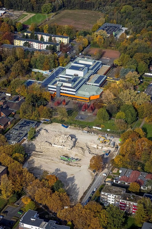 Aerial view, Ingeborg-Drewitz comprehensive school and construction site with demolition of the high-rise Rentfort-Nord business centre on Schwechater Straße in the Rentfort district of Gladbeck, Ruhr area, North Rhine-Westphalia, Germany, demolition, construction area, construction site, building plots, construction project, construction site, education, educational institution, DE, Europe, comprehensive school, Gladbeck, teaching institute, aerial view, aerial photography, aerial photography, school, overview, bird's eye view, bird's eye view, overview