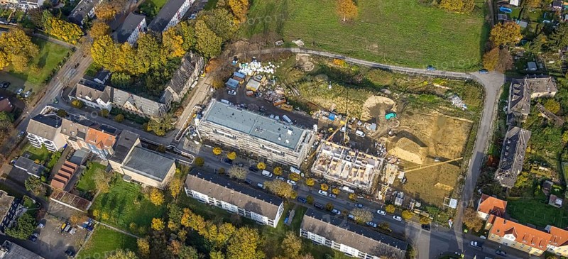 Aerial view, Schlägel und Eisen housing estate with construction site for the new construction of a nursing home for the elderly and residential quarter on the corner of Bohnekampstrasse and Schlägelstrasse in the district of Zweckel in Gladbeck, Ruhr area, North Rhine-Westphalia, Germany, residential home for the elderly, construction work, construction area, construction site, building plots, construction project, construction project, construction site, care and nursing, DE, Europe, Gladbeck, property tax, real estate, aerial view, aerial photography, aerial photography, new construction, care facility, retirement home, overview, bird's-eye view, residential complex, living and living, residential area, residential buildings, residential quality, residential neighbourhood, housing estate, birds-eyes view, overview