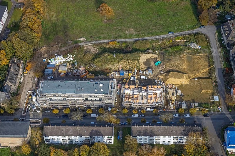 Aerial view, Schlägel und Eisen housing estate with construction site for the new construction of a nursing home for the elderly and residential quarter on the corner of Bohnekampstrasse and Schlägelstrasse in the district of Zweckel in Gladbeck, Ruhr area, North Rhine-Westphalia, Germany, residential home for the elderly, construction work, construction area, construction site, building plots, construction project, construction project, construction site, care and nursing, DE, Europe, Gladbeck, property tax, real estate, aerial view, aerial photography, aerial photography, new construction, care facility, retirement home, overview, bird's-eye view, residential complex, living and living, residential area, residential buildings, residential quality, residential neighbourhood, housing estate, birds-eyes view, overview