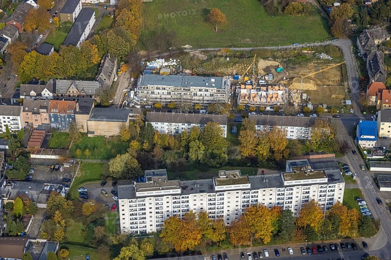 Aerial view, Schlägel und Eisen housing estate with construction site for the new construction of a nursing home for the elderly and residential quarter on the corner of Bohnekampstrasse and Schlägelstrasse in the district of Zweckel in Gladbeck, Ruhr area, North Rhine-Westphalia, Germany, residential home for the elderly, construction work, construction area, construction site, building plots, construction project, construction project, construction site, care and nursing, DE, Europe, Gladbeck, property tax, real estate, aerial view, aerial photography, aerial photography, new construction, care facility, retirement home, overview, bird's-eye view, residential complex, living and living, residential area, residential buildings, residential quality, residential neighbourhood, housing estate, birds-eyes view, overview