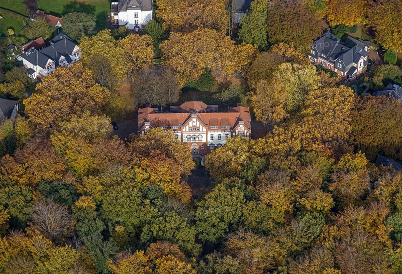 Aerial view, music school of the city of Gladbeck in the autumnal forest in the district Rentfort in Gladbeck, Ruhr area, North Rhine-Westphalia, Germany, DE, Europe, Gladbeck, aerial view, aerial photography, aerial photography, school, overview, bird's eye view, birds-eyes view, overview