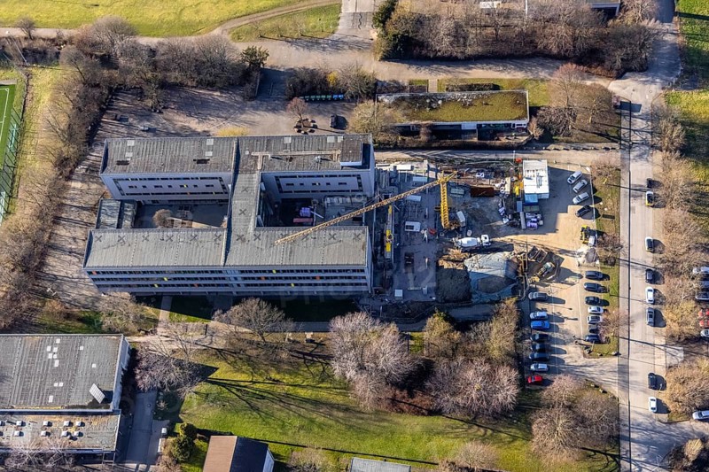 Aerial view, construction site of new extension at Theodor-Heuss-Gymnasium, Altenhagen, Hagen, Ruhr area, North Rhine-Westphalia, Germany, construction work, building, construction area, building site, building plots, construction crane, construction measure, construction project, building site, education, educational institution, DE, Europe, grammar school, Humpertstraße, teaching institute, aerial view, aerial photography, aerial photography, new building, school, overview, bird's eye view, birds-eyes view, overview
