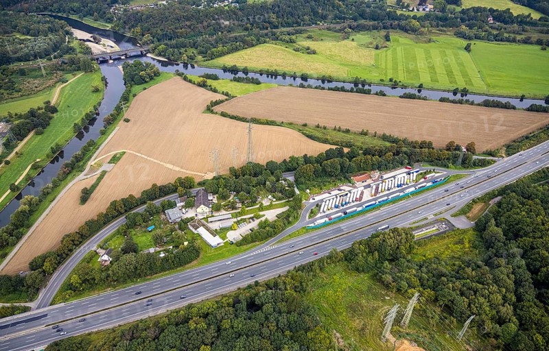 Aerial view, Lennhof service area on the A1 motorway with Lennemündung into the Ruhr in the district of Boele in Hagen, Ruhr area, North Rhine-Westphalia, Germany, motorway, DE, Europe, freight traffic, Hagen, aerial view, aerial photography, aerial photography, car parks, Lennhof service area, road traffic, overview, traffic volume, bird's eye view, overview