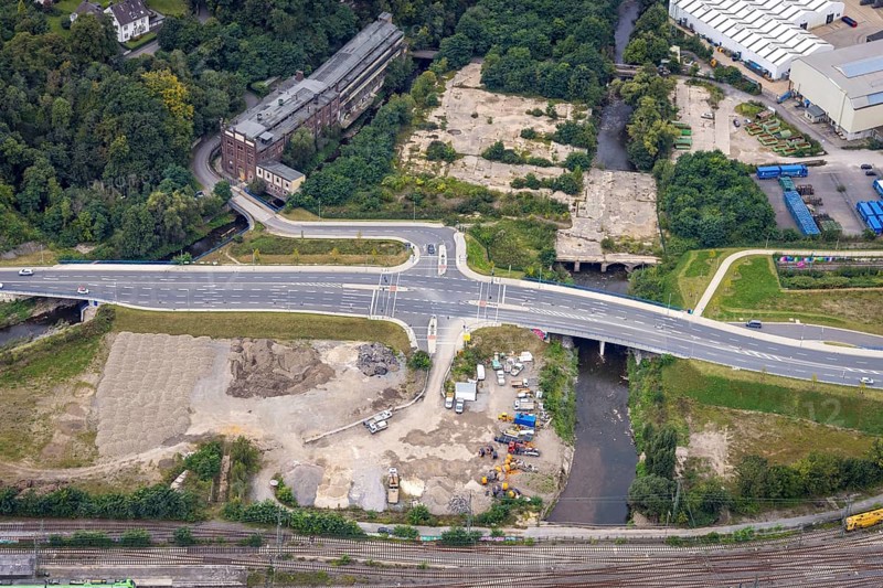 Aerial view, Westside City construction area and construction site between new road with river Volme and former screw factory Funcke and Hueck as well as main station in the district Altenhagen in Hagen, Ruhr area, North Rhine-Westphalia, Germany, railway tracks, railway station, construction work, construction area, construction site, building plots, construction project, construction site, DE, Deutsche Bahn AG, Europe, Hagen, main station, main station, aerial view, aerial photography, aerial photography, overview, bird's-eye view, overview