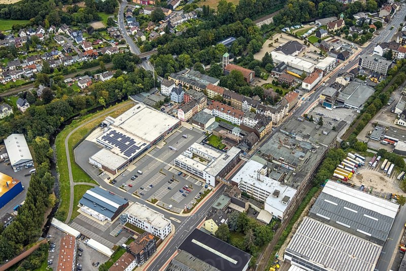 Aerial view, shopping centre and commercial area Enneper Straße as well as St. Konrad church and former Brandt factory in the Haspe-West district of Hagen, Ruhr area, North Rhine-Westphalia, Germany, place of worship, DE, shopping centre, shopping markets, shopping centre, Europe, commercial enterprises, commercial area, commercial park, commercial location, commercial use, religious community, place of worship, Hagen, holy site, industrial area, industrial site, church, church community, denomination, aerial view, aerial photography, aerial photography, local supply centre, religion, religious site, overview, bird's-eye view, overview