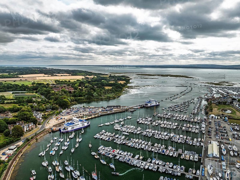Wight Light car ferry to Isle of Wight on Lymington River and marina from drone, Lymington, New Forest, Hampshire, England, United Kingdom
