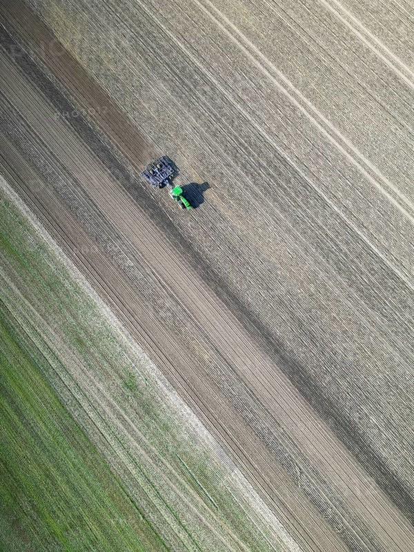 Field work, tractor, ploughing, cultivating, sowing peas, fertilising, agricultural work, harvesting, grain, field work with tractors, harvest festival, aerial view, agricultural machine, Saxony-Anhalt, Germany