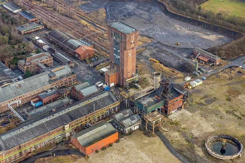 Aerial view with hammerhead tower at Ost Zeche Heinrich Robert colliery, CreativRevier in Wiescherhöfen, Hamm, Ruhr area, North Rhine-Westphalia, Germany, mine, Heinrich Robert colliery, DE, Europe, commercial enterprises, commercial area, commercial park, commercial location, commercial use, industrial facilities, industrial area, industrial building, industrial site, aerial view, aerial photograph, aerial photography, aerial photography, Rhine-Ruhr metropolitan region, coal mine, tower, overview, bird's-eye view, birds-eyes view, former Ost colliery, historical, historical site, overview, destroyed building