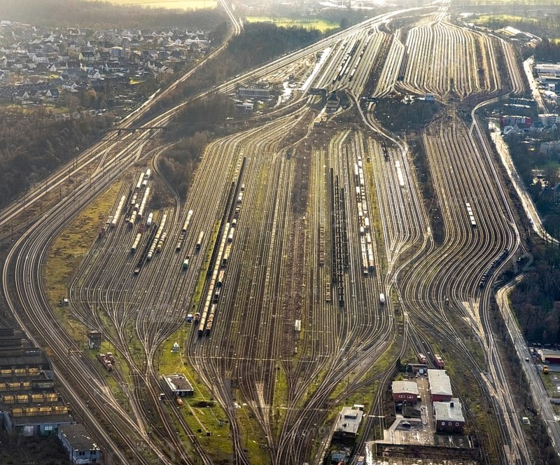 Aerial view shunting yard and freight yard in backlight in Hamm, Ruhr area, North Rhine-Westphalia, Germany, railway tracks, railway station, DE, Deutsche Bahn AG, Europe, backlight, railway tracks, Hamm, aerial view, aerial photograph, aerial photography, aerial photography, Rhine-Ruhr metropolitan region, overview, bird's eye view, birds-eyes view, former signal box, overview