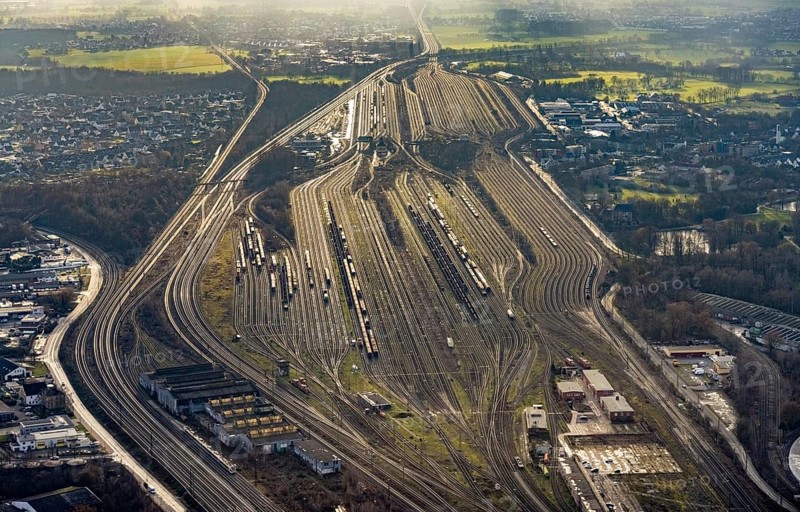 Aerial view shunting yard and freight yard in backlight in Hamm, Ruhr area, North Rhine-Westphalia, Germany, railway tracks, railway station, DE, Deutsche Bahn AG, Europe, backlight, railway tracks, Hamm, aerial view, aerial photograph, aerial photography, aerial photography, Rhine-Ruhr metropolitan region, overview, bird's eye view, birds-eyes view, former signal box, overview