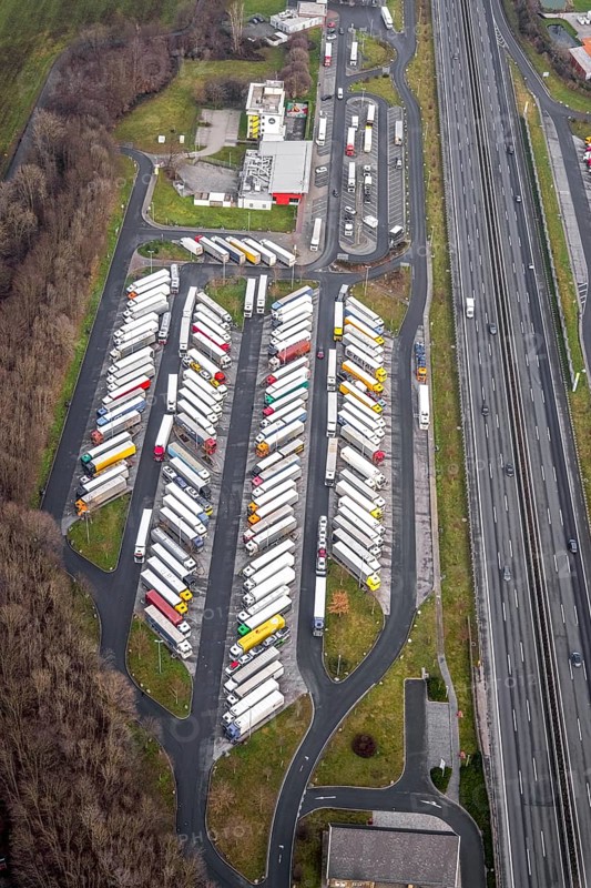 Aerial view motorway service area Rhynern-Nord and Rhynern-Süd on the A2 motorway, truck parking, Hamm, Ruhr area, North Rhine-Westphalia, Germany, A2 motorway, DE, Europe, shapes and colours, freight traffic, logistics, aerial view, aerial photograph, aerial photography, aerial photography, Rhine-Ruhr metropolitan region, parking spaces, service area, service area, transport, overview, bird's eye view, bird's eye view, overview