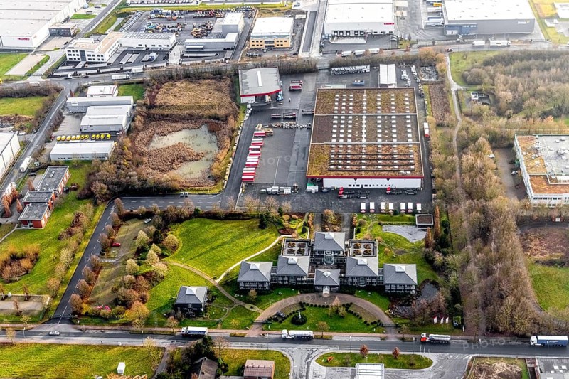 Aerial view southern extension of Rhynern industrial estate in Hamm, Ruhr area, North Rhine-Westphalia, Germany, DE, Europe, commercial enterprises, commercial area, commercial park, commercial location, commercial use, Hamm, industrial area, industrial building, industrial location, aerial view, aerial photograph, aerial photography, aerial photography, Rhine-Ruhr metropolitan region, Oberster Kamp, overview, bird's-eye view, overview, DEG Dach-Fassade-Holz eG, Dachdecker einkauf Hamm
