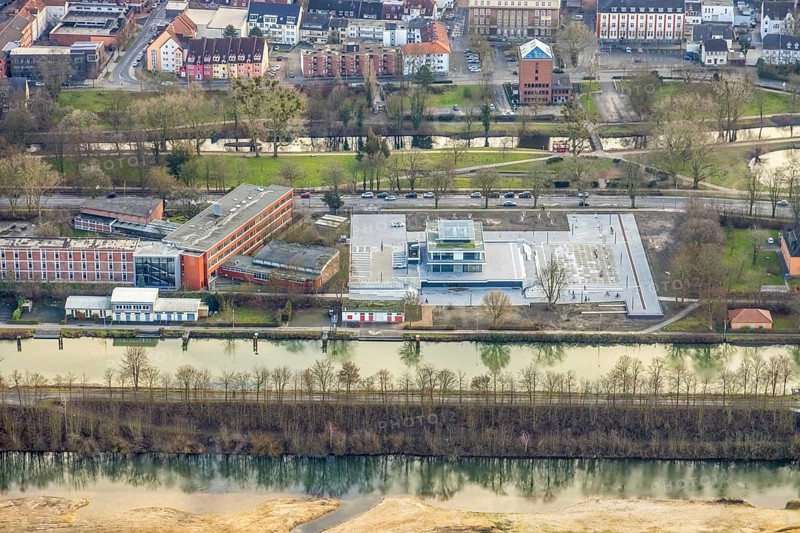 Aerial view construction area new water sports centre on Adenauerallee at Hammonense grammar school with transition to Nordring and Hans-Böckler-Platz in Hamm, Ruhr area, North Rhine-Westphalia, Germany, construction work, construction vehicles, construction area, construction site, building plots, construction crane, construction measure, construction project, construction site, education, educational institution, DE, Datteln-Hamm Canal, development, Europe, river Lippe, business park, grammar school, Hamm, industrial area, canal edge, educational institute, aerial view, aerial photograph, aerial photography, aerial photography, Rhine-Ruhr metropolitan region, new building, shipping, school, overview, bird's-eye view, overview