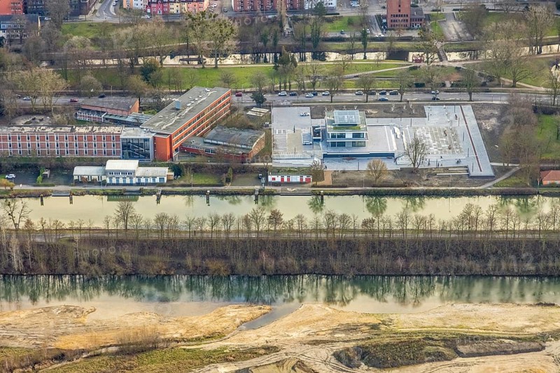 Aerial view construction area new water sports centre on Adenauerallee at Hammonense grammar school with transition to Nordring and Hans-Böckler-Platz in Hamm, Ruhr area, North Rhine-Westphalia, Germany, construction work, construction vehicles, construction area, construction site, building plots, construction crane, construction measure, construction project, construction site, education, educational institution, DE, Datteln-Hamm Canal, development, Europe, river Lippe, business park, grammar school, Hamm, industrial area, canal edge, educational institute, aerial view, aerial photograph, aerial photography, aerial photography, Rhine-Ruhr metropolitan region, new building, shipping, school, overview, bird's-eye view, overview