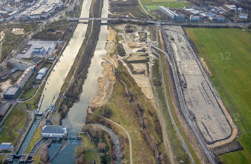 Aerial view construction area new building water sports centre at Adenauerallee at Hammonense grammar school, fallow land river Lippe and Datteln-Hamm canal and lock in Hamm, Ruhr area, North Rhine-Westphalia, Germany, construction work, construction vehicles, construction area, construction site, building plots, construction crane, construction measure, construction project, construction site, education, educational institution, DE, Datteln-Hamm Canal, development, Europe, Hamm airfield, River Lippe, business park, grammar school, Hamm, industrial area, canal edge, educational institute, Lippe floodplain, aerial view, aerial photograph, aerial photography, aerial photography, Rhine-Ruhr metropolitan region, new construction, shipping, Hamm lock, school, overview, bird's-eye view, overview