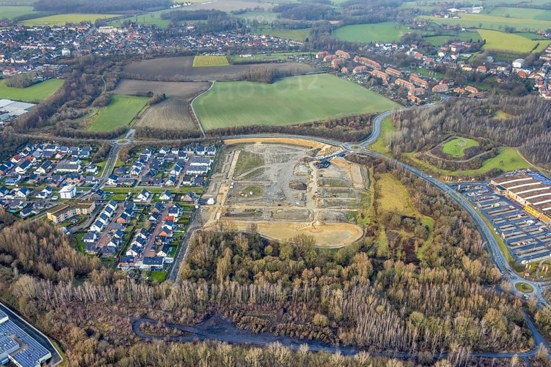 Construction area at Sachsenring with housing estate in the district of Heessen in Hamm, Ruhr area, North Rhine-Westphalia, Germany, construction work, building, construction area, building site, building plots, construction project, construction site, DE, Europe, property tax, Hamm, real estate, roundabout, roundabout, aerial view, aerial photograph, aerial photography, aerial photography, Rhine-Ruhr metropolitan region, new construction, overview, bird's-eye view, residential complex, living and living, residential area, residential buildings, residential quality, residential quarter, housing estate, birds-eyes view, overview