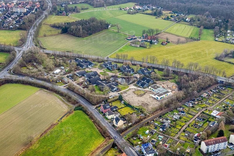 Aerial view of the AhsePark housing estate on Caldenhofer Weg with a new day care centre in Hamm, Ruhr area, North Rhine-Westphalia, Germany, Ahsestrolche, construction work, construction, construction vehicles, construction area, building site, building plots, construction crane, construction measure, construction project, construction site, DE, development, Europe, Hamm, real estate, capacity requirement, kindergarten, day-care centre, day-care facility, day-care centre, aerial photograph, aerial photography, aerial photography, Rhine-Ruhr metropolitan region, new building, overview, bird's-eye view, residential complex, residential area, residential buildings, residential quarter, housing estate, birds-eyes view, former Glunz village, overview