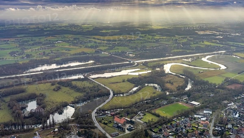 Aerial view of the nature reserve Am Tibaum, river Lippe meander and Datteln-Hamm canal, water weir with fish ladder, Hamm, Ruhr area, North Rhine-Westphalia, Germany, DE, Europe, backlight, landscape, landscape in backlight, aerial view, aerial photograph, aerial photography, aerial photography, Rhine-Ruhr metropolitan region, nature reserve, overview, bird's-eye view, overview